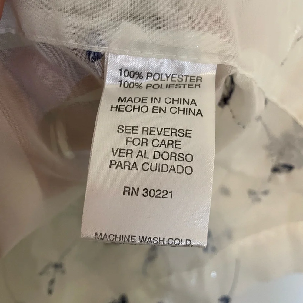 White Sheer Shower Curtains with a pattern delicate blue flowers through out